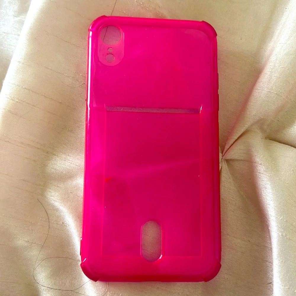 in good condition neon pink card holder phone case